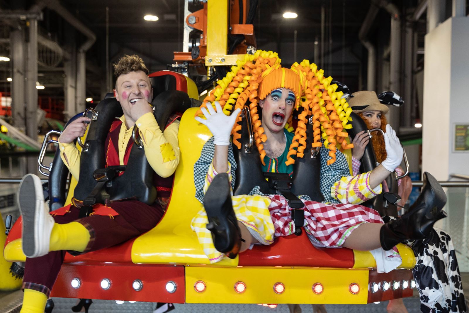 Pantomime Dame on a fairground ride